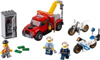 Купить конструктор Lego Tow Truck Trouble 60137  по цене от 1499 грн.