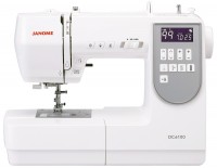 Купить швейная машина / оверлок Janome DC 6100  по цене от 32640 грн.