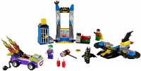 Купить конструктор Lego The Joker Batcave Attack 10753  по цене от 1799 грн.