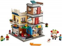 Купить конструктор Lego Townhouse Pet Shop and Cafe 31097: цена от 4199 грн.