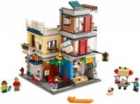 Купить конструктор Lego Townhouse Pet Shop and Cafe 31097: цена от 5999 грн.