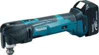 Купить многофункциональный инструмент Makita DTM51RT: цена от 13342 грн.