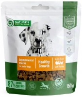 Купити корм для собак Natures Protection Snack Poultry Healthy Growth 150 g  за ціною від 169 грн.